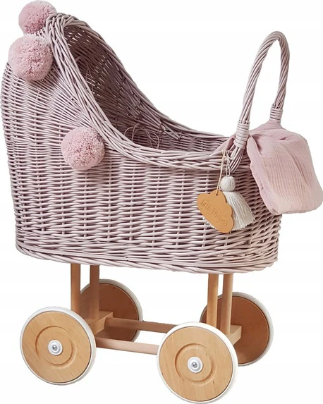 wysoki wózek wiklinowy dla lalek różowy z pomponami różowymi pomysł na prezent